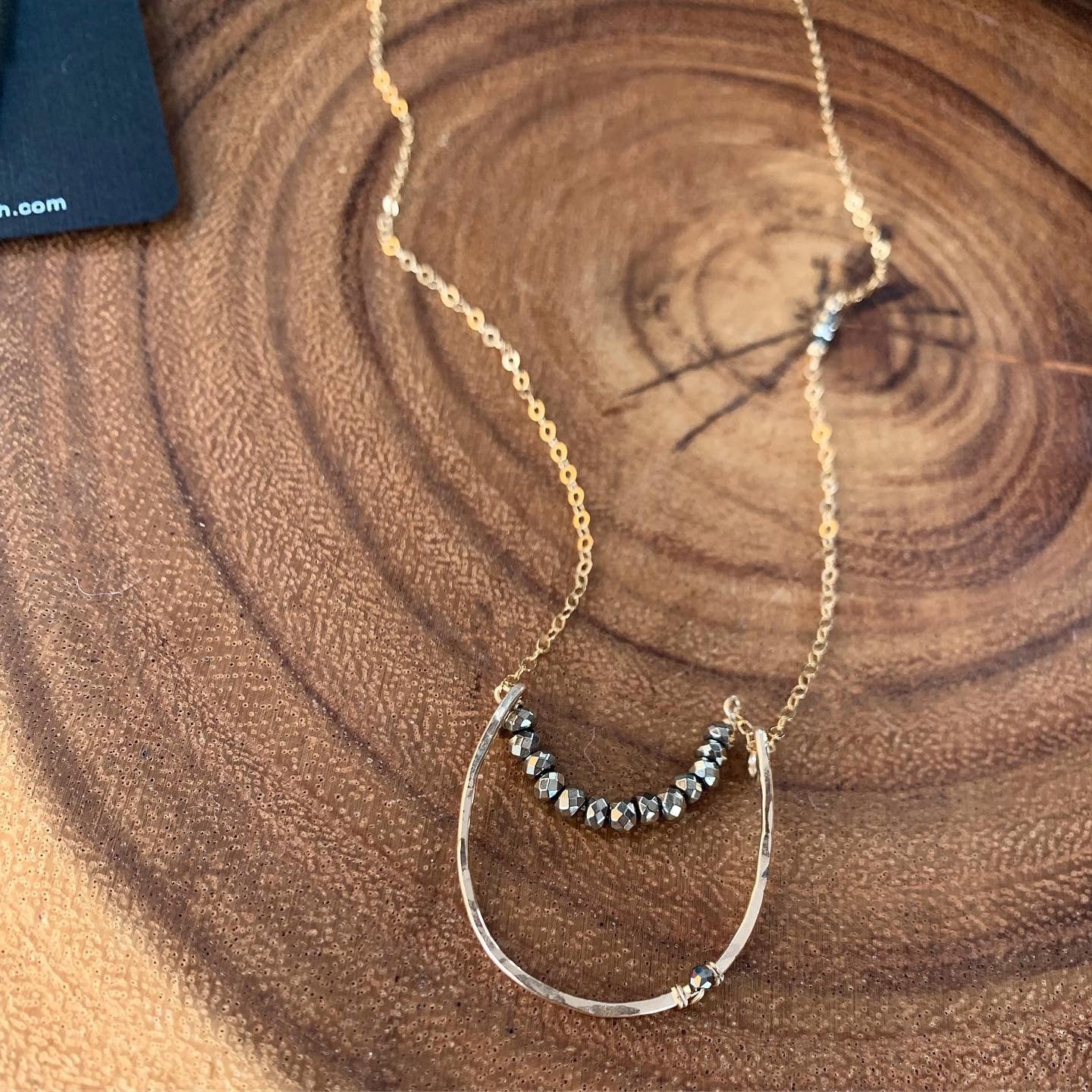 Floating Pyrite Crescent Necklace