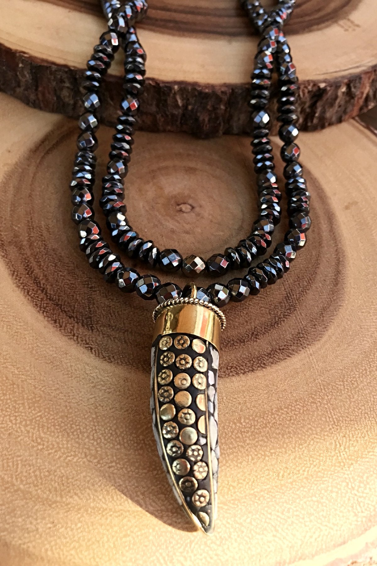 Horn on Harnessed Hematite ('H3')